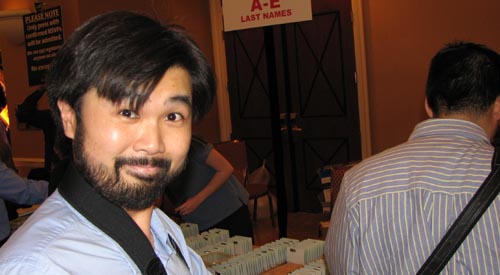 stephen fung at the digital experience sign-in booth