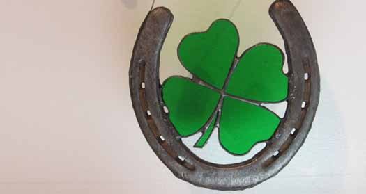Lucky horseshoe with four-leaf clover Lucky horseshoe with four-leaf clover